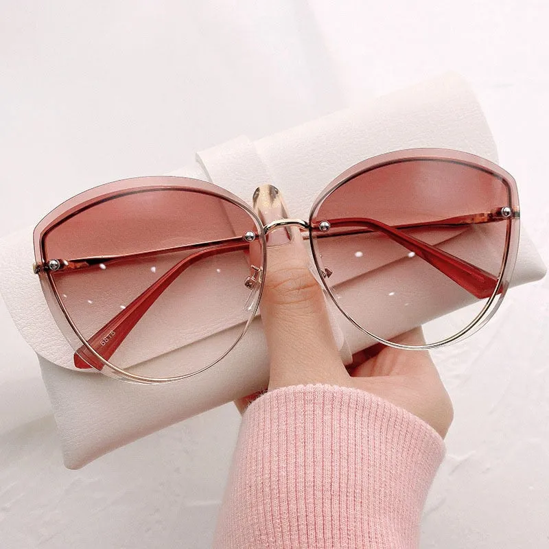 High Quality Oval Rimless Sunglasses