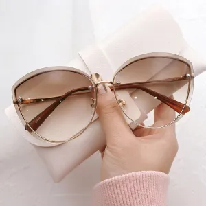 High Quality Oval Rimless Sunglasses
