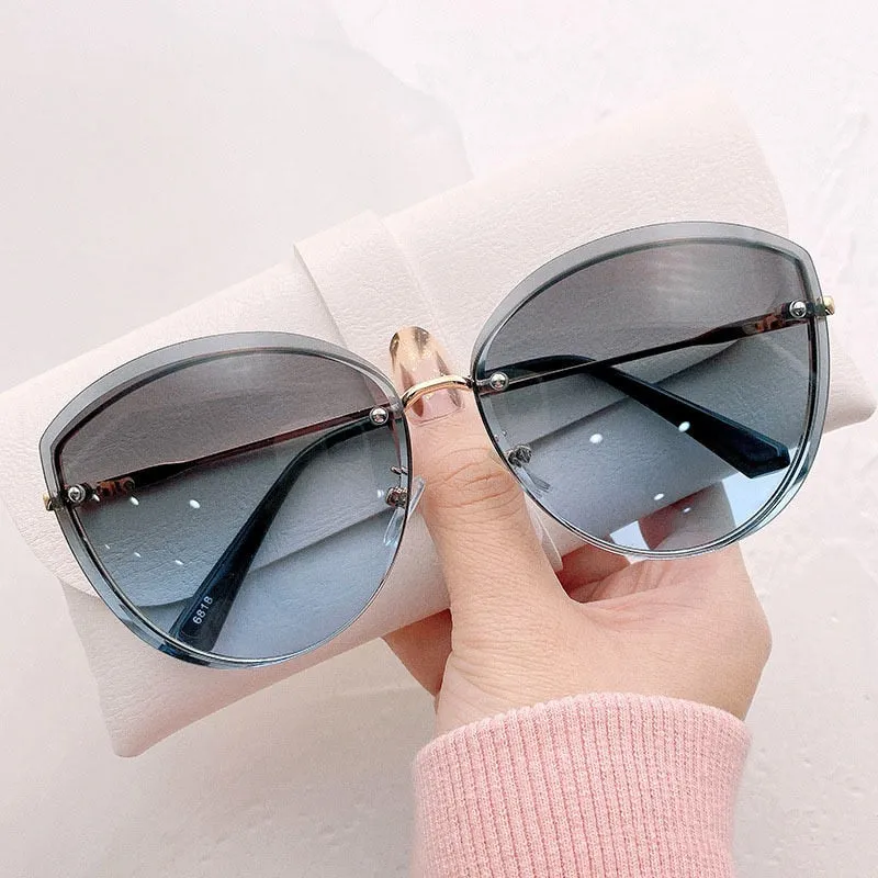 High Quality Oval Rimless Sunglasses
