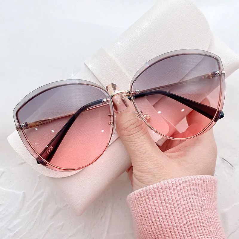 High Quality Oval Rimless Sunglasses