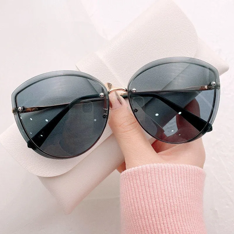 High Quality Oval Rimless Sunglasses